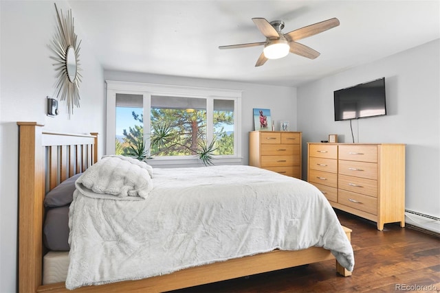 2976 Hiwan Dr, Evergreen, CO 80439 - bedroom featuring dark wood finished floors and a ceiling fan