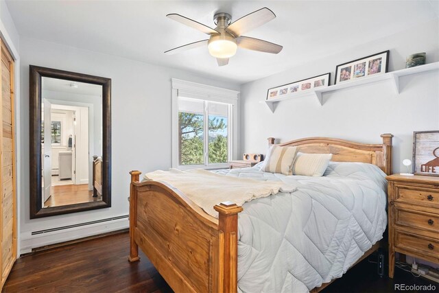 2976 Hiwan Dr, Evergreen, CO 80439 - bedroom featuring baseboard heating, wood finished floors, and ceiling fan