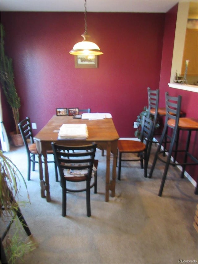 view of carpeted dining room