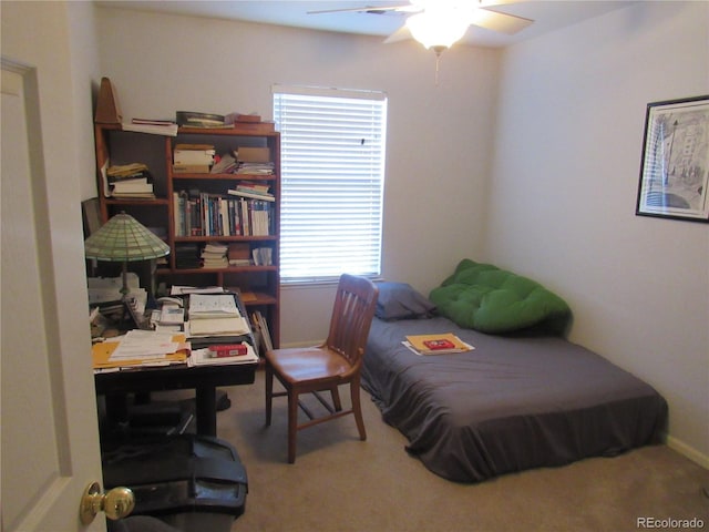 bedroom with ceiling fan and carpet flooring