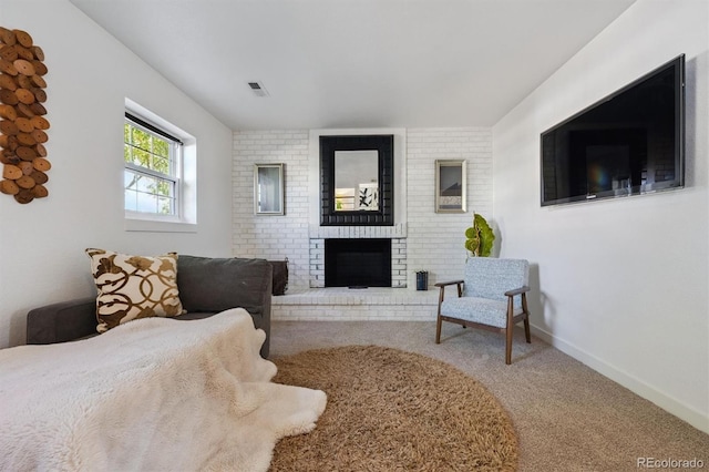 9222 Albion St, Thornton, CO 80229 - carpeted living room featuring a brick fireplace and baseboards