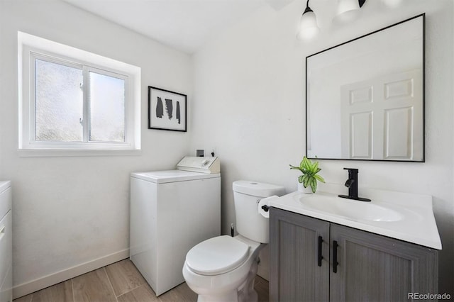 9222 Albion St, Thornton, CO 80229 - bathroom with vanity and wood finished floors
