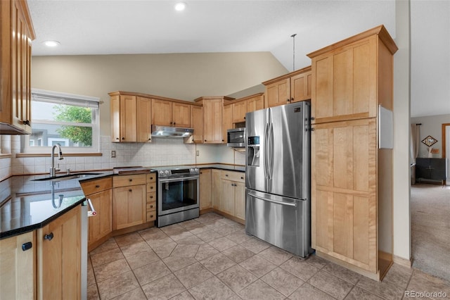 kitchen with sink, light tile patterned flooring, light brown cabinets, and appliances with stainless steel finishes