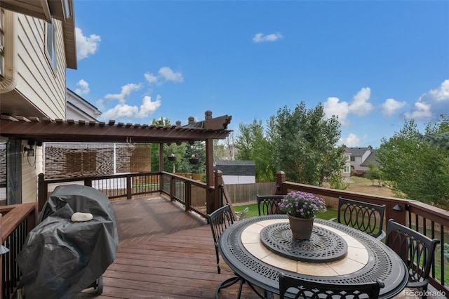 wooden deck featuring grilling area