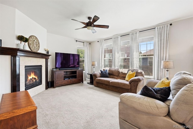 6471 S Ider St, Aurora, CO 80016 - living room featuring ceiling fan, carpet, healthy amount of natural light, and a tile fireplace
