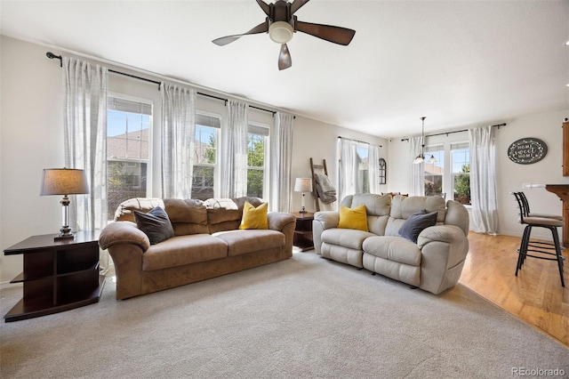 6471 S Ider St, Aurora, CO 80016 - living room with a ceiling fan and light wood-style flooring