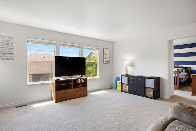 6471 S Ider St, Aurora, CO 80016 - carpeted living area featuring baseboards