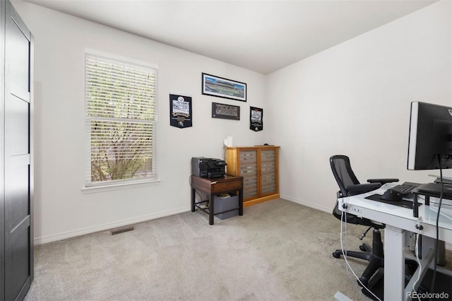 6471 S Ider St, Aurora, CO 80016 - office area featuring healthy amount of natural light and light carpet