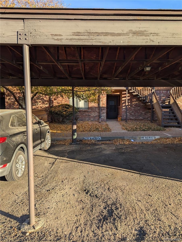 view of parking with a carport