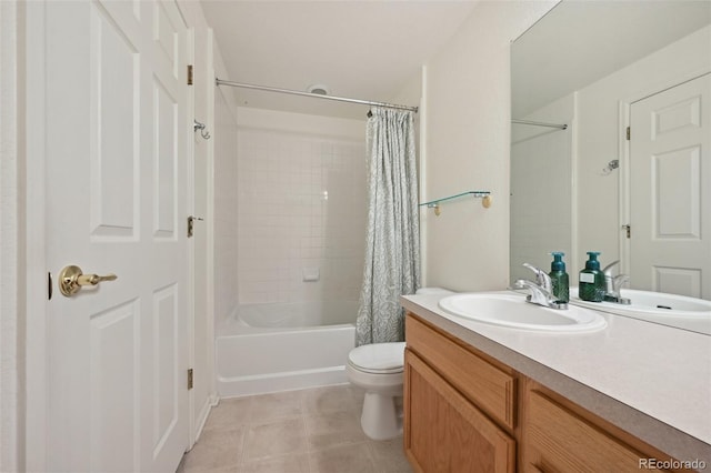 bathroom featuring vanity, toilet, shower / tub combo, and tile patterned floors