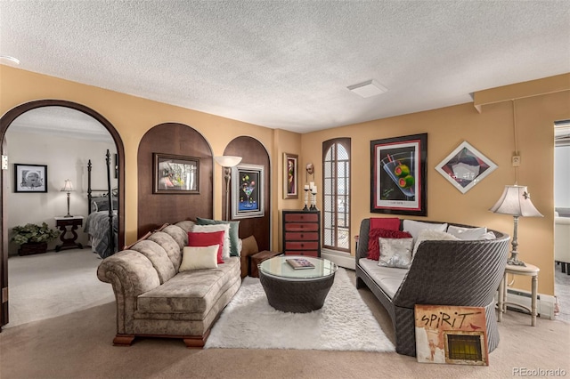 living room with light carpet and a textured ceiling