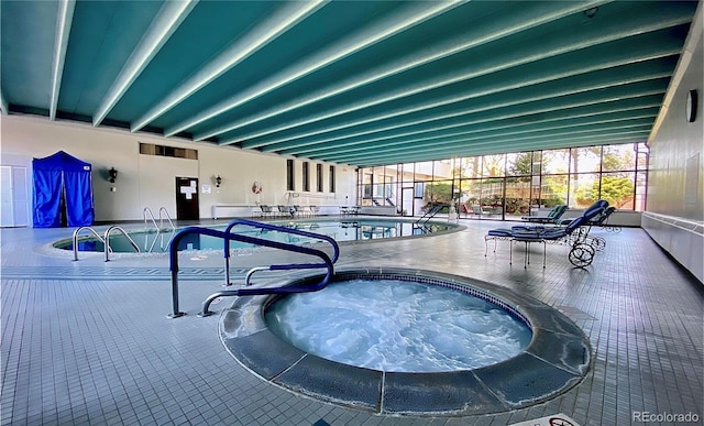 view of pool featuring an indoor hot tub