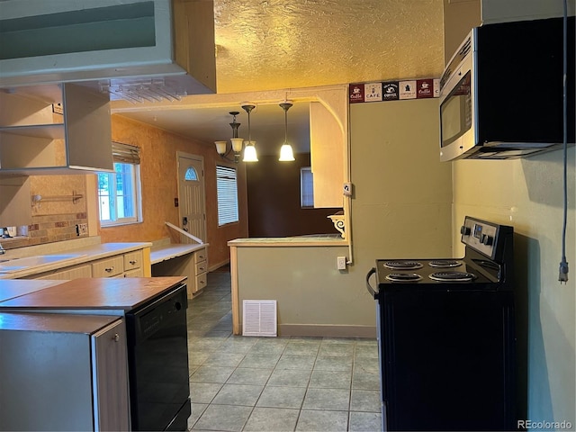 527 S Bryant St, Denver, CO 80219 - kitchen featuring black appliances, light tile patterned flooring, open shelves, decorative light fixtures, and a textured ceiling