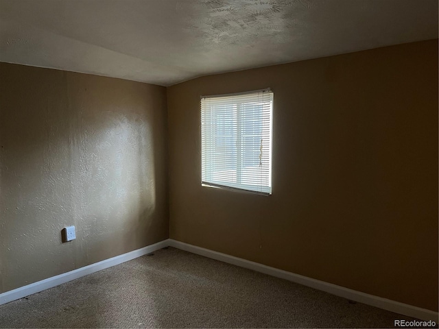 527 S Bryant St, Denver, CO 80219 - unfurnished room with baseboards and light carpet