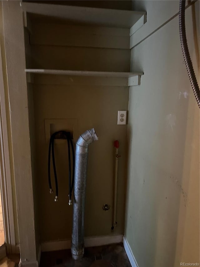 527 S Bryant St, Denver, CO 80219 - washroom featuring baseboards