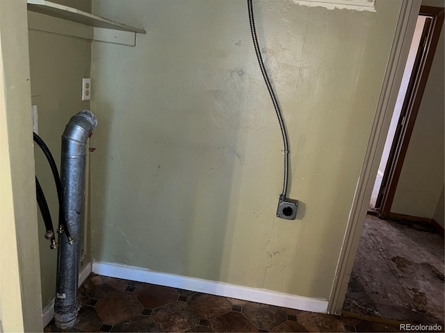 527 S Bryant St, Denver, CO 80219 - laundry view of baseboards