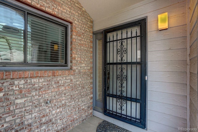 11186 E Baltic Dr, Aurora, CO 80014 - doorway to property with brick siding