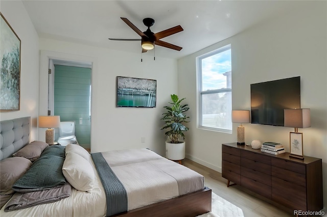 bedroom featuring light hardwood / wood-style floors and ceiling fan