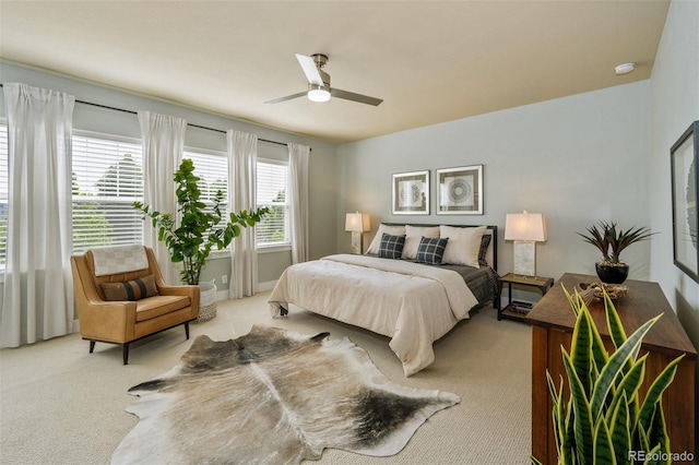 817 Uinta Way, Denver, CO 80230 - bedroom with light carpet and a ceiling fan