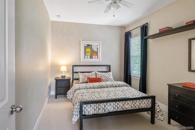 817 Uinta Way, Denver, CO 80230 - bedroom with light colored carpet, baseboards, and ceiling fan