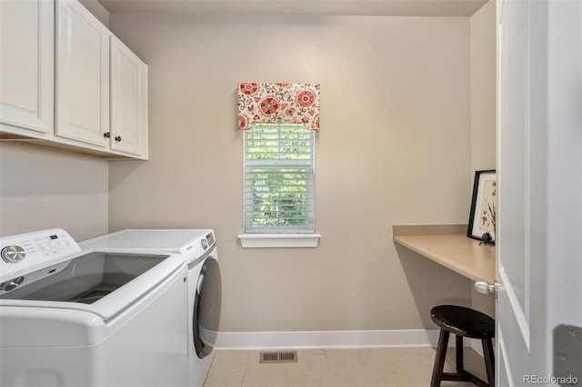 817 Uinta Way, Denver, CO 80230 - laundry area with cabinet space, independent washer and dryer, baseboards, and light tile patterned flooring