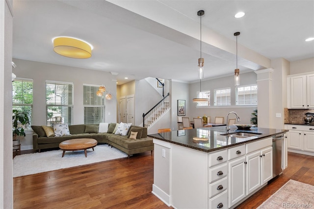 817 Uinta Way, Denver, CO 80230 - kitchen with plenty of natural light, dishwasher, tasteful backsplash, dark wood finished floors, and recessed lighting