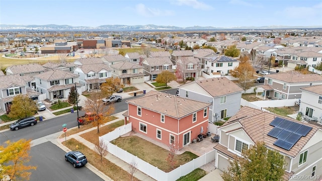 aerial view of residential area with a mountain backdrop
