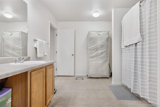 full bath with vanity and curtained shower