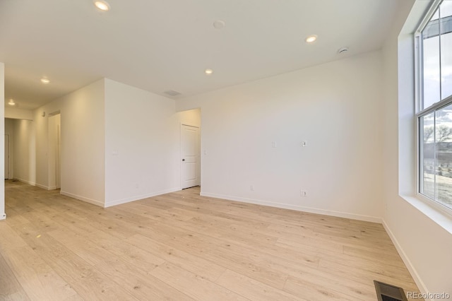 empty room featuring light wood-type flooring