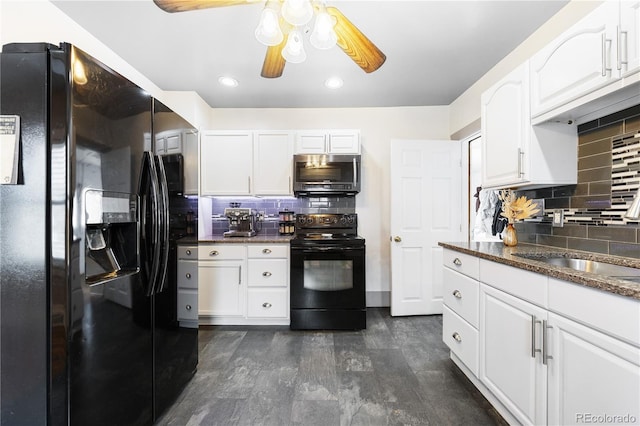 kitchen featuring ceiling fan, white cabinetry, dark stone countertops, backsplash, and black appliances