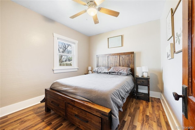 bedroom featuring baseboards, ceiling fan, and wood finished floors