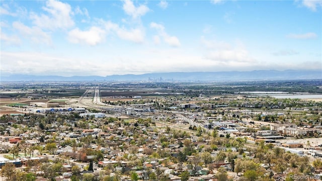 birds eye view of property featuring a mountain view