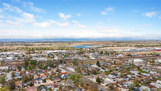aerial view featuring a water view and a residential view