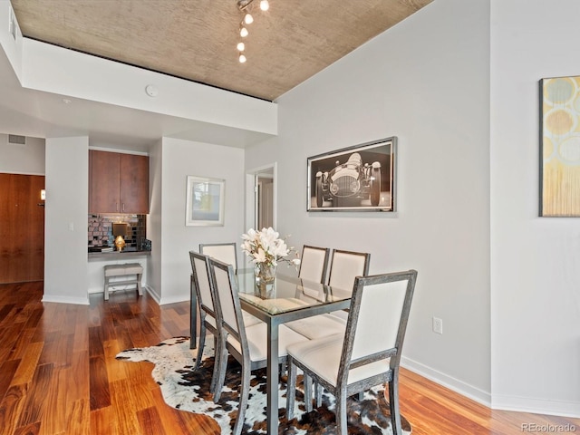 dining room with light wood-type flooring