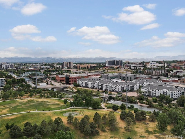 birds eye view of property featuring a mountain view