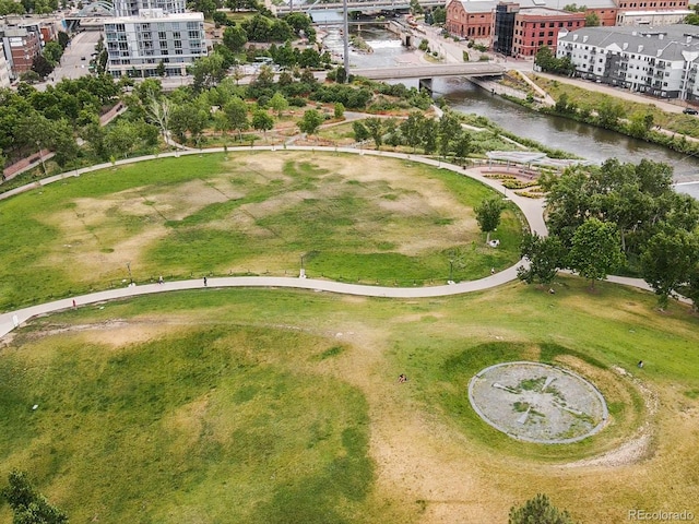 birds eye view of property featuring a water view