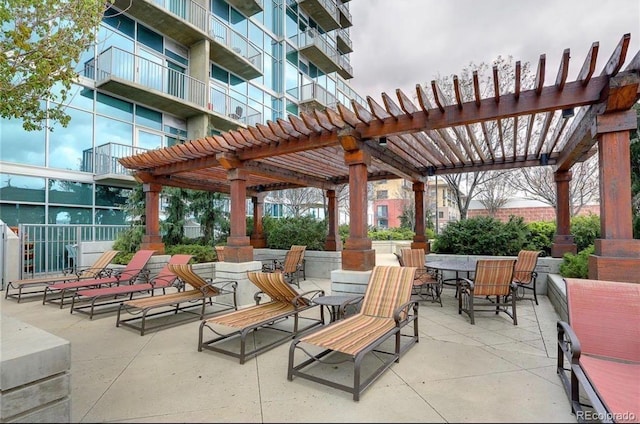 view of patio featuring a pergola