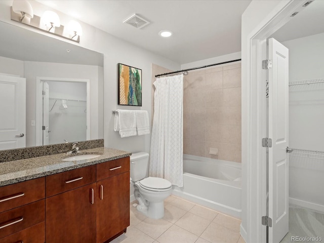 full bathroom featuring tile patterned flooring, vanity, shower / bath combination with curtain, and toilet