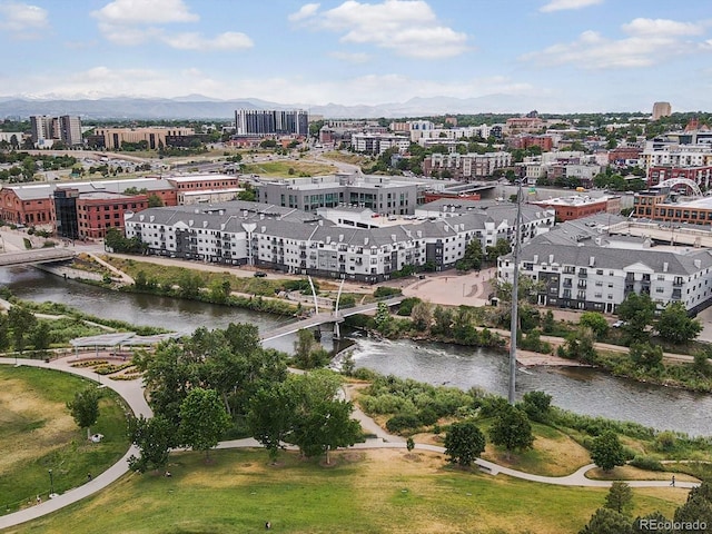 aerial view featuring a water and mountain view