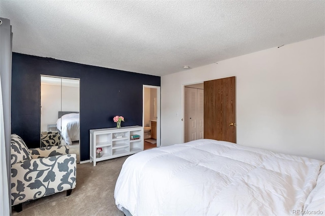 3407 S Ammons St Unit 20-2, Lakewood, CO 80227 - bedroom featuring carpet floors and a textured ceiling
