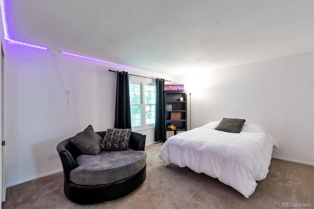 3407 S Ammons St Unit 20-2, Lakewood, CO 80227 - bedroom with carpet flooring and baseboards
