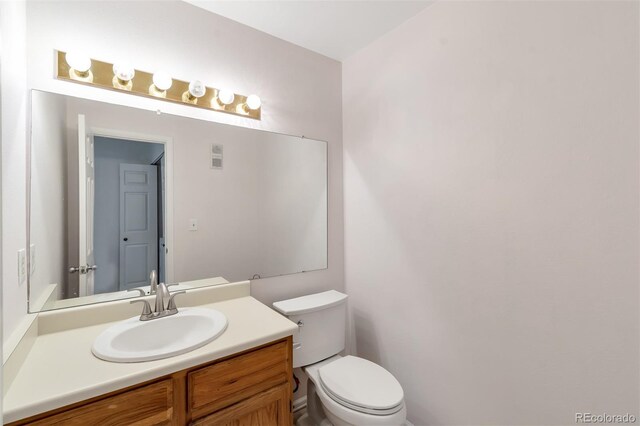 3407 S Ammons St Unit 20-2, Lakewood, CO 80227 - half bath featuring toilet and vanity