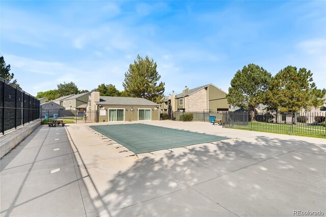 3407 S Ammons St Unit 20-2, Lakewood, CO 80227 - view of pool with a residential view and a patio