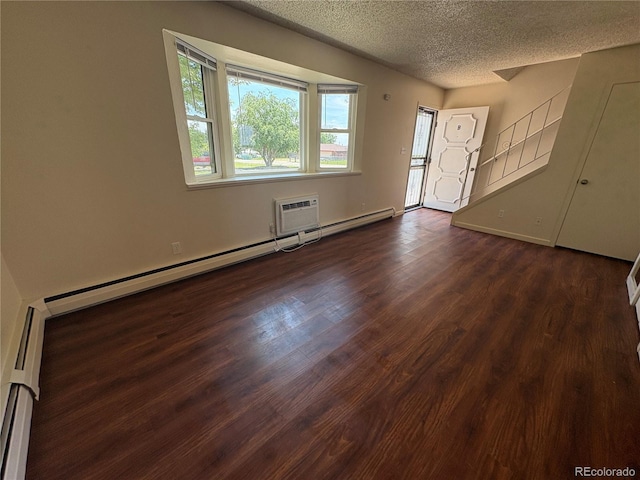 6905 Mariposa St Unit B, Denver, CO 80221 - entryway with a baseboard radiator, a textured ceiling, dark wood-style floors, and a wall mounted air conditioner