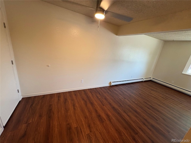 6905 Mariposa St Unit B, Denver, CO 80221 - spare room featuring wood finished floors, a textured ceiling, ceiling fan, and baseboard heating