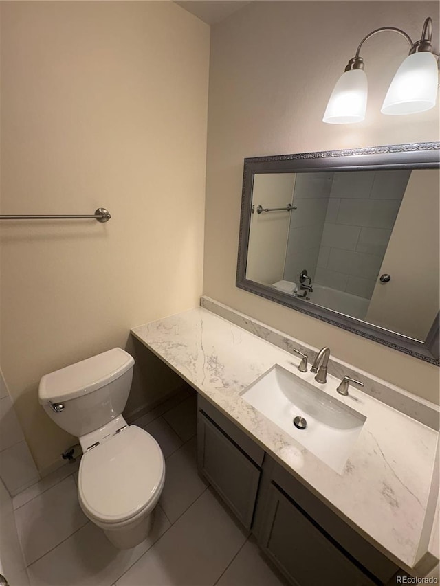 6905 Mariposa St Unit B, Denver, CO 80221 - bathroom with vanity, tile patterned flooring, and a shower