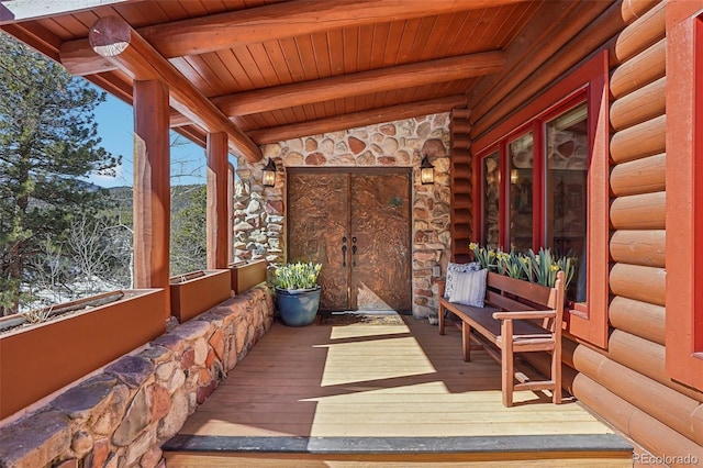 wooden terrace with covered porch