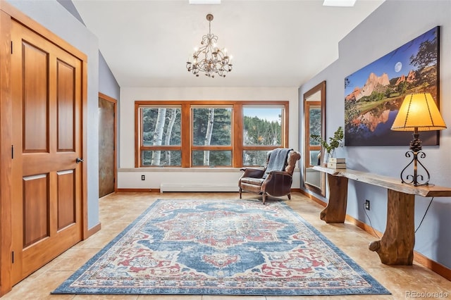 sitting room featuring lofted ceiling, a baseboard heating unit, baseboards, and an inviting chandelier