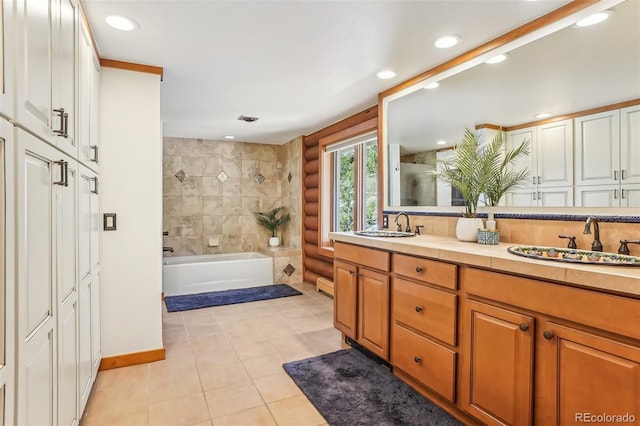 bathroom with a bathtub, double vanity, a sink, tile patterned flooring, and walk in shower