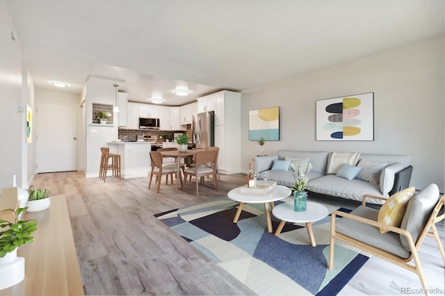 living room featuring light hardwood / wood-style flooring